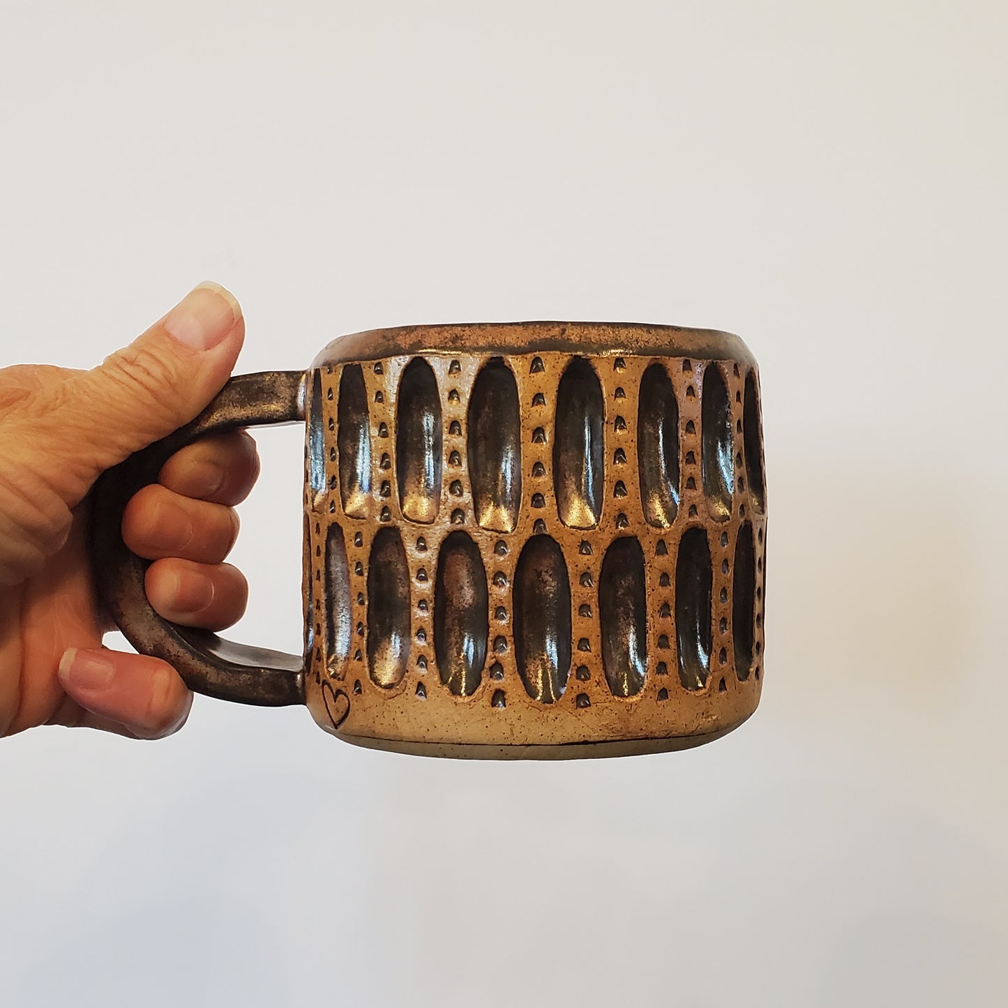 Bronzed Coliseum Carved Mug