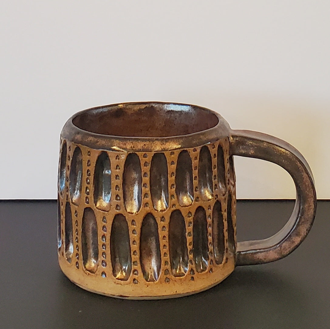 Bronzed Coliseum Carved Mug